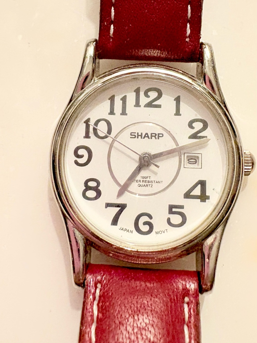 SHARP SHP2060 Quartz
Analog Watch White Dial
Arabic Date WR 30m Red Leather